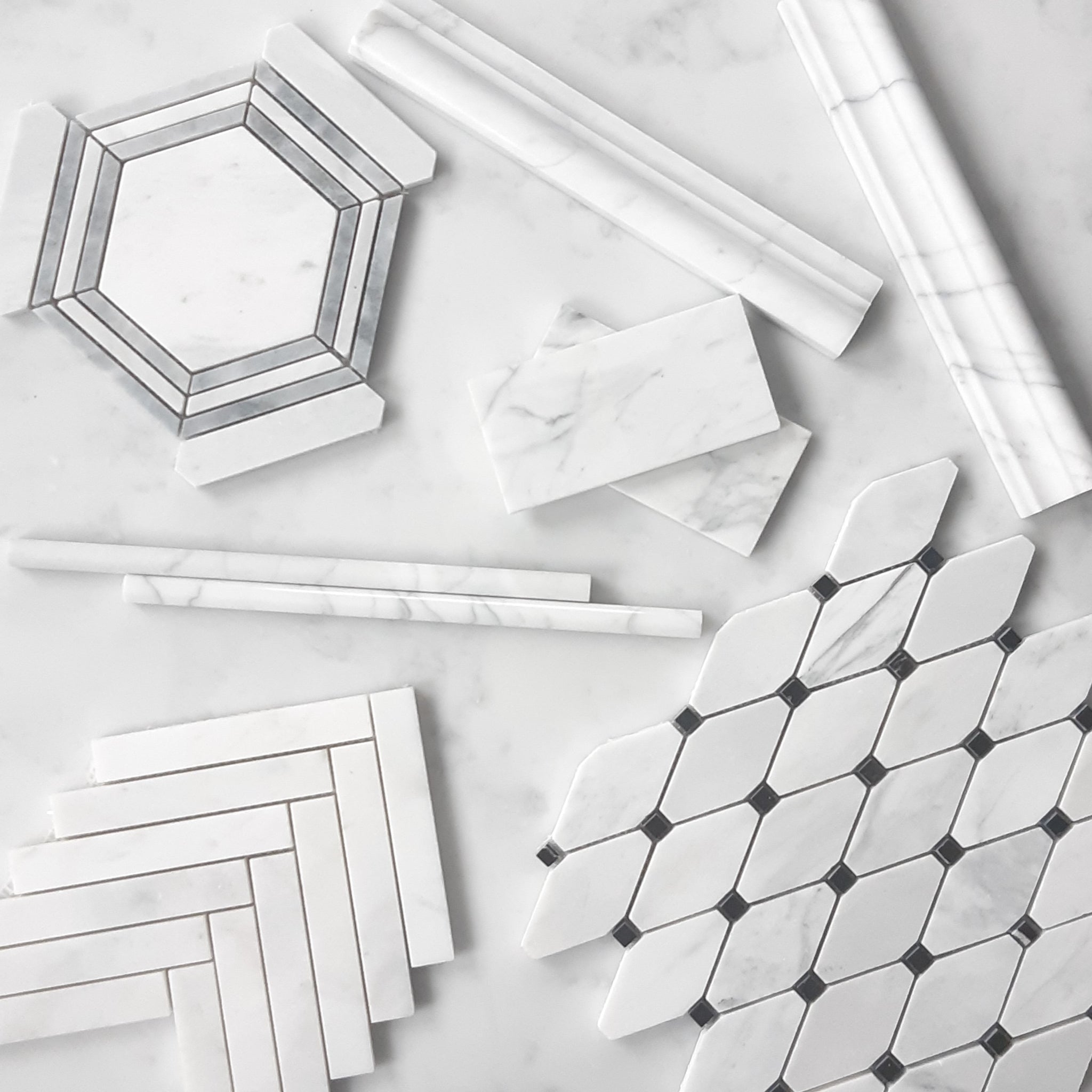 Carrara White Italian Marble 1" x 6" Herringbone Mosaic Tile Honed