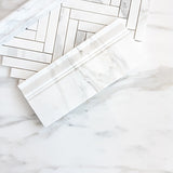 Calacatta Gold Marble 1" x 6" Herringbone Mosaic Tile Honed